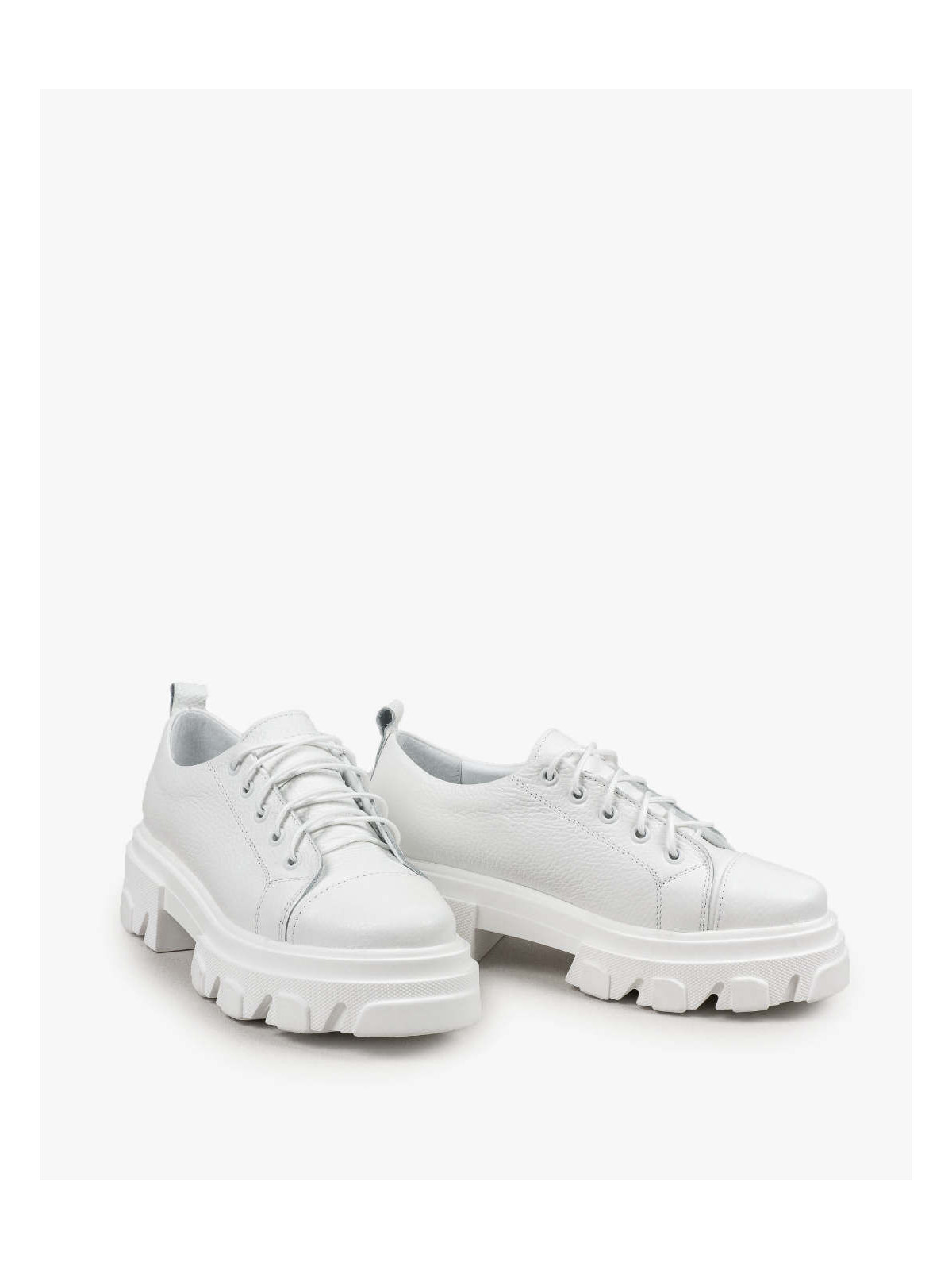 Białe trapery damskie skórzane