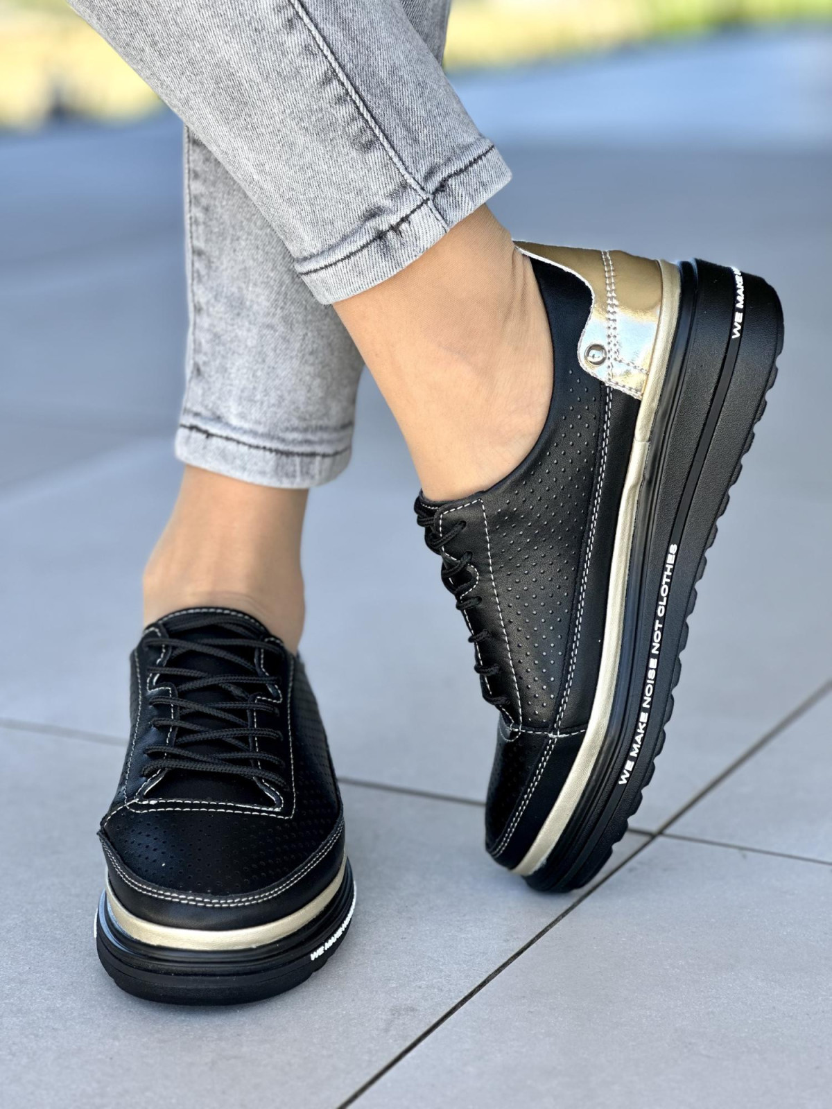 Czarne z dodatkiem złota trampki damskie ze skóry naturalnej