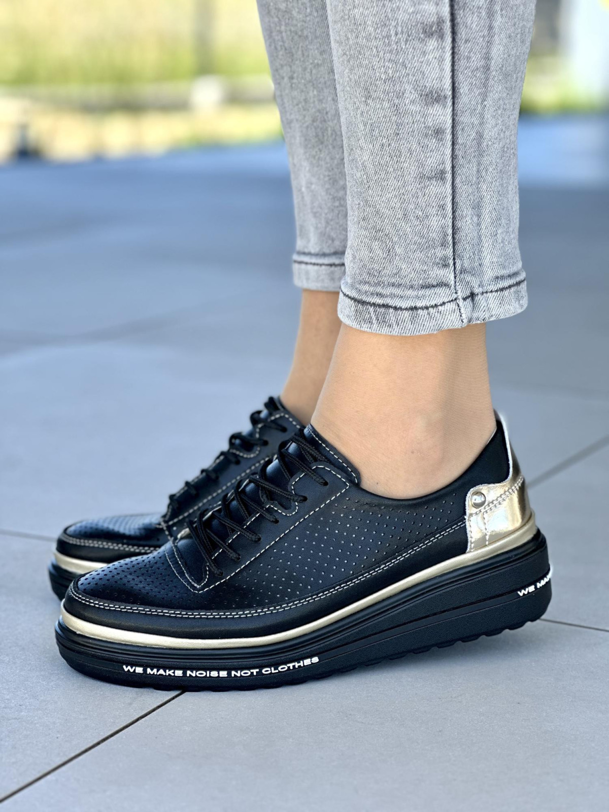 Czarne z dodatkiem złota trampki damskie ze skóry naturalnej