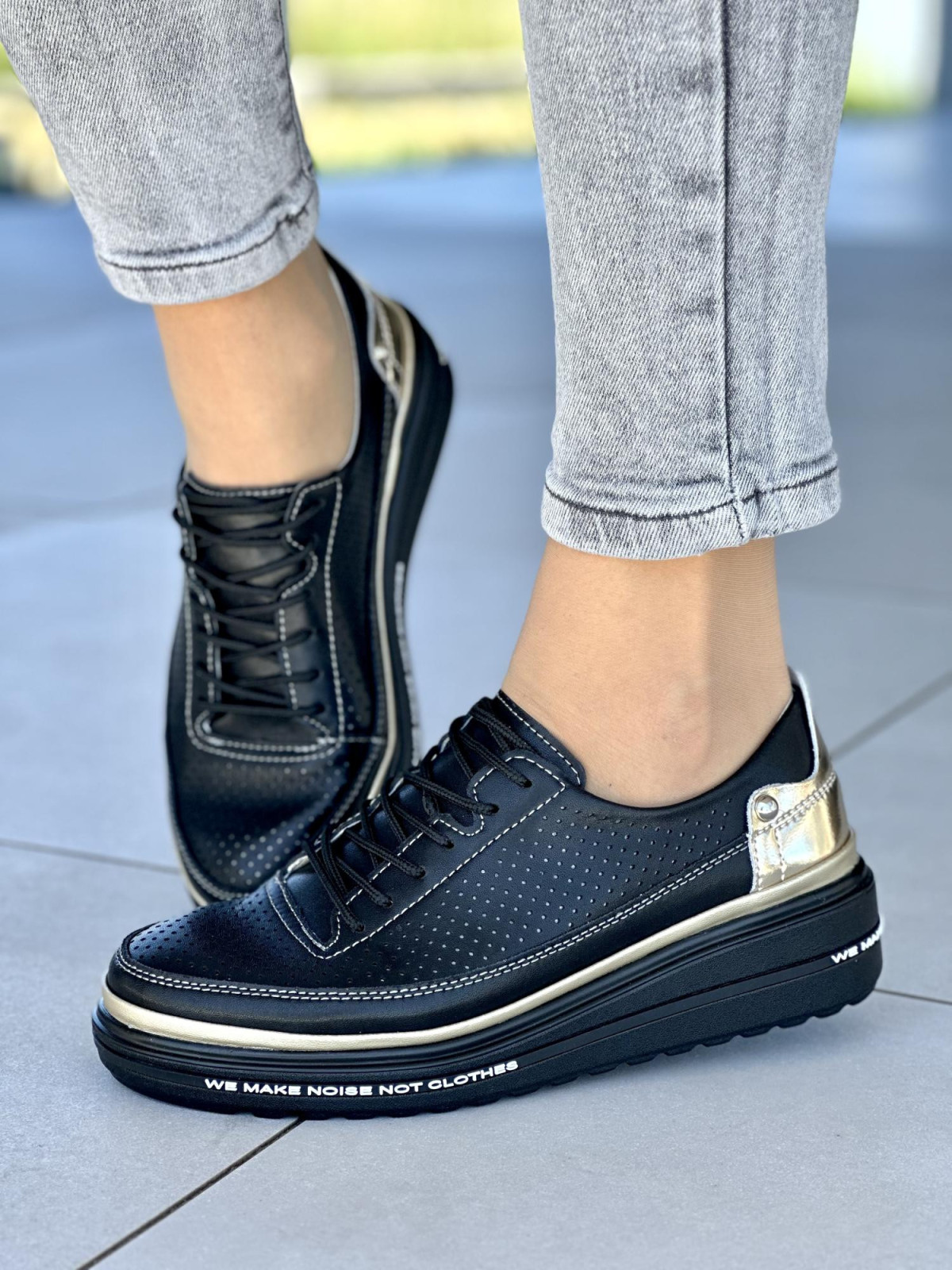 Czarne z dodatkiem złota trampki damskie ze skóry naturalnej