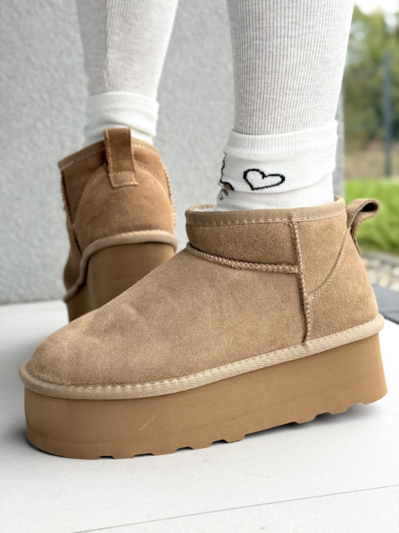 Śniegowce z Naturalnej Skóry – Ciepło i Styl w Każdym Kroku