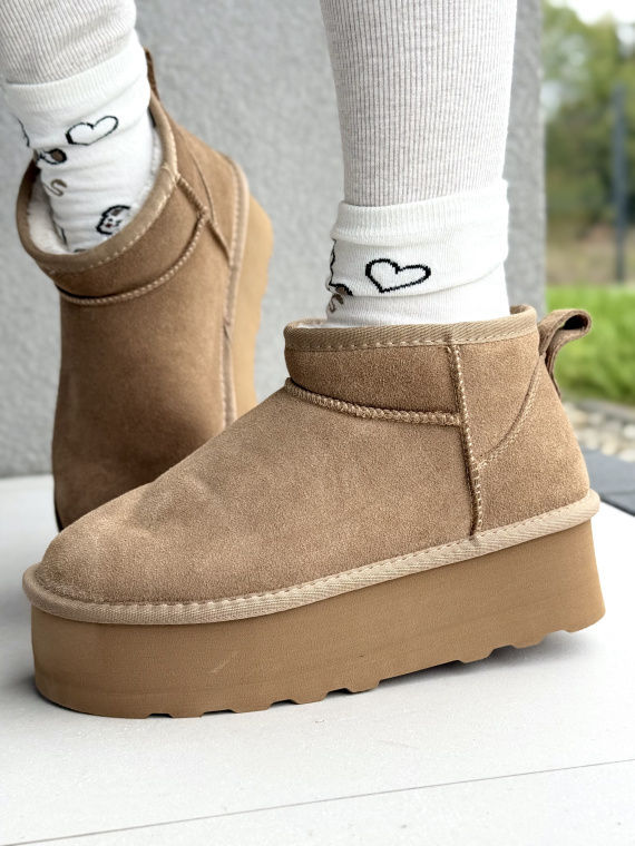 Śniegowce z Naturalnej Skóry – Ciepło i Styl w Każdym Kroku