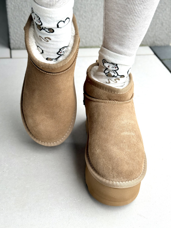 Śniegowce z Naturalnej Skóry – Ciepło i Styl w Każdym Kroku