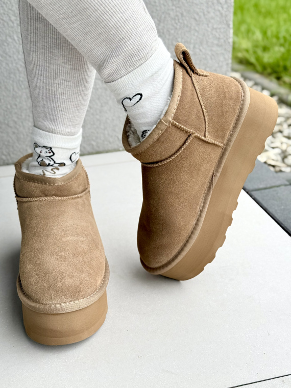 Śniegowce z Naturalnej Skóry – Ciepło i Styl w Każdym Kroku