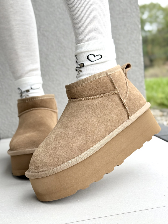 Śniegowce z Naturalnej Skóry – Ciepło i Styl w Każdym Kroku