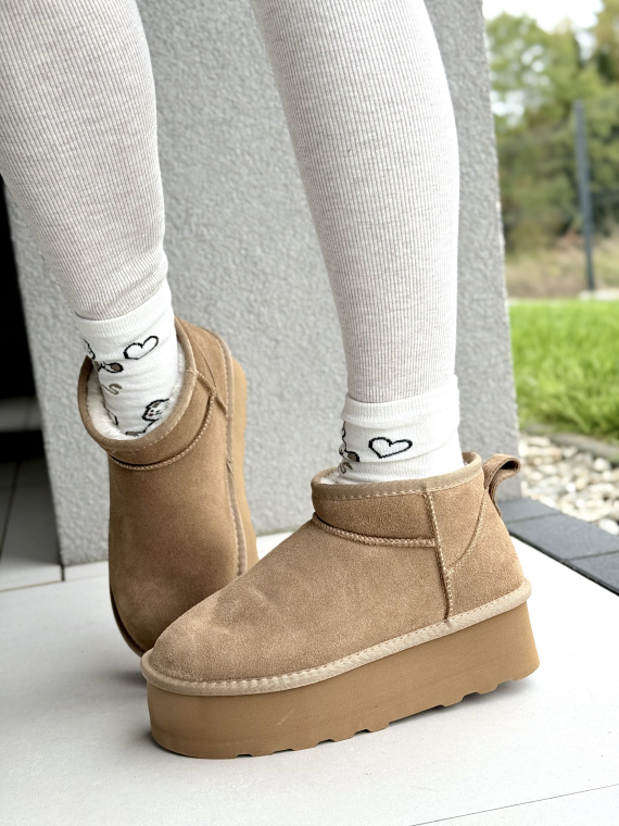 Śniegowce z Naturalnej Skóry – Ciepło i Styl w Każdym Kroku